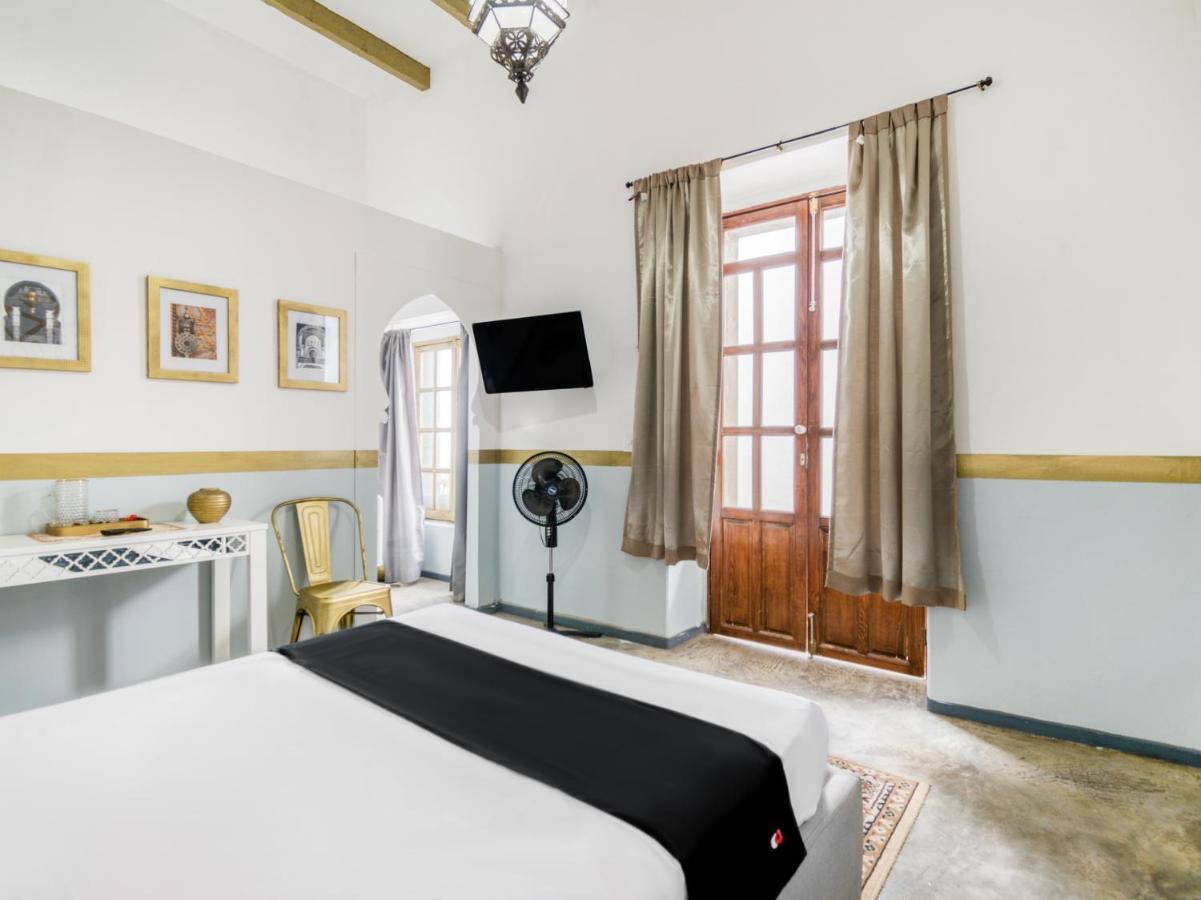 Capital O Hotel Riad كويريتارو المظهر الخارجي الصورة